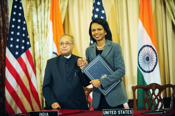 Secretary Condolezza Rice and Indian Foreign Minister Pranab Mukherjee, sign the US-India Civilian Nuclear Cooperation Agreement. Secretary Condolezza Rice and Indian Foreign Minister Pranab Mukherjee, sign the US-India Civilian Nuclear Cooperation Agreement.